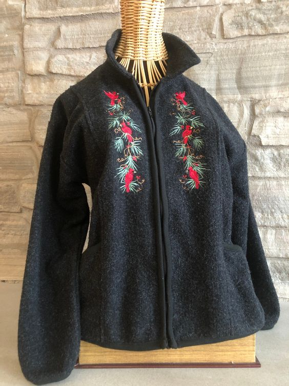 dark grey fleece jacket with birds embroidery